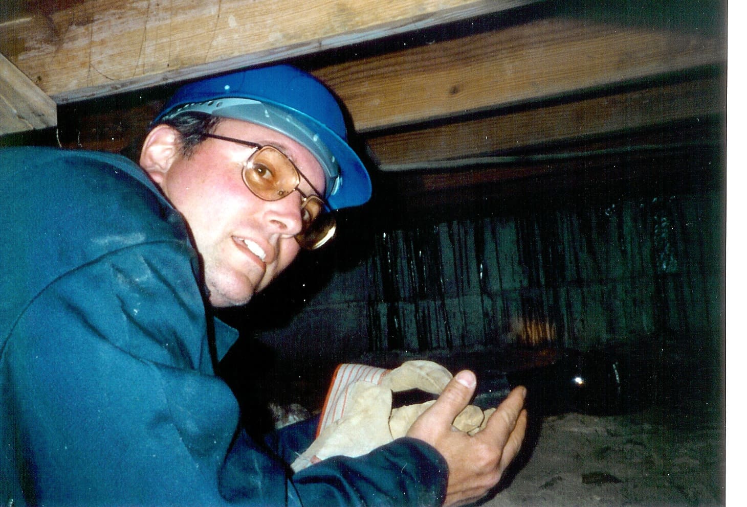 A man holding something in his hands.