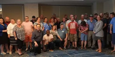 A group of people posing for a picture.