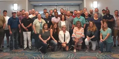 A group of people posing for a picture.
