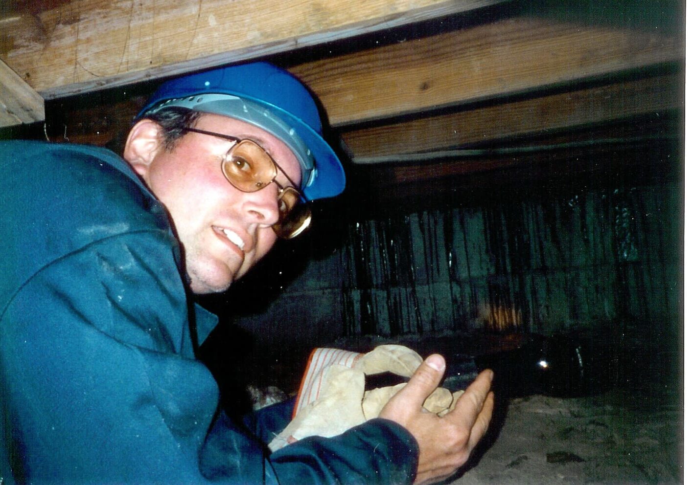 A man holding something in his hands.